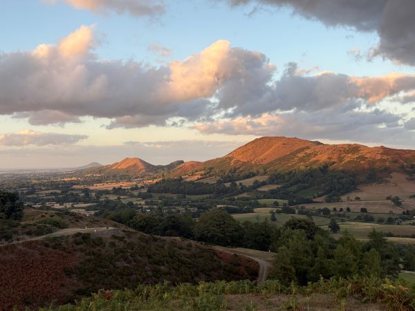 A sunset view from Stanyeld towards Caer Caradoc, The Lawley and the Wrekin